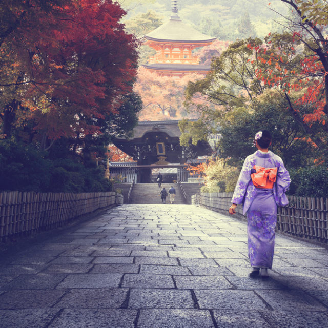 Japanese,Woman,Walking,To,Red,Pagoda,,Japan